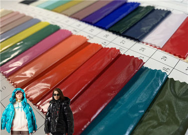 tela resistente de capa brillante de la chaqueta del invierno del cuidado fácil del aceite de la PU 100%Nylon