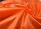 Prenda impermeable ligera de la PU de la falsificación de Cire de la poliamida material brillante de nylon de la tela del 100% abajo de la tela de la chaqueta