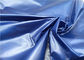 Prenda impermeable ligera de la PU de la falsificación de Cire de la poliamida material brillante de nylon de la tela del 100% abajo de la tela de la chaqueta
